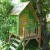 Kinderspielhaus Stelzenhaus aus Holz mit Rutsche Test